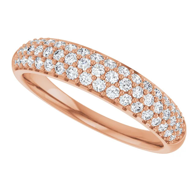 Shimmering round brilliant diamonds encircle this elegant anniversary band designed in 14K rose gold and featuring pave-setting.