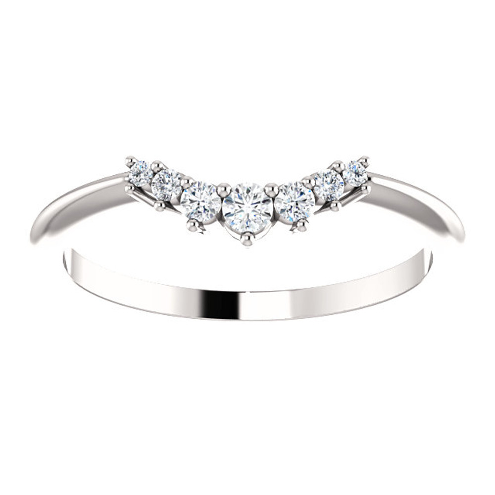 On your wedding day, speak your vows proudly as you slip this ring on her waiting finger. Fashioned in sleek 14K white gold, this band is set with a quartet of shimmering diamonds, all totaling 1/8 ct. Slightly contoured, this band was designed to fit snuggly beneath her solitaire. Polished to a brilliant shine, it's destined to become one of her most treasured pieces.