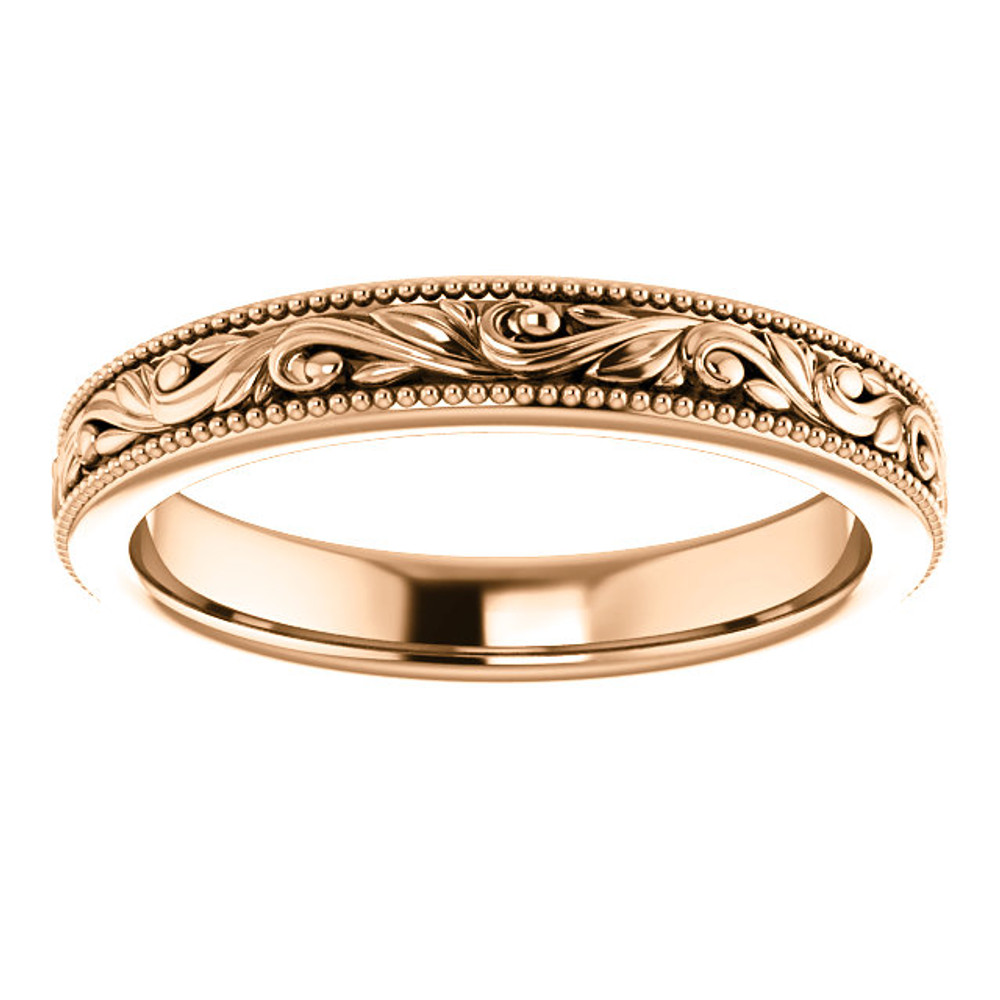 Exquisitely hand-engraved, this wedding ring features a beautiful design in 14k rose gold.