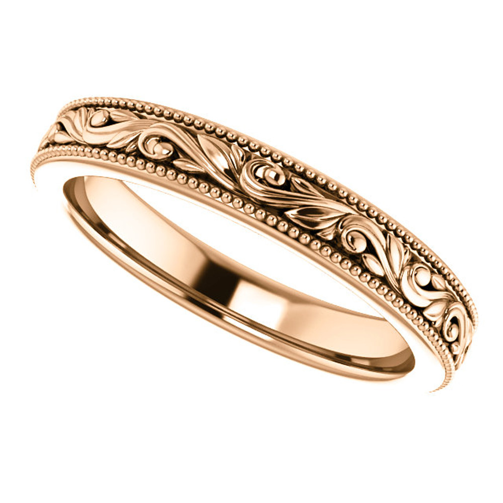 Exquisitely hand-engraved, this wedding ring features a beautiful design in 14k rose gold.