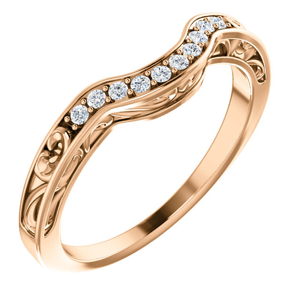 This beautiful diamond wedding band features sparkling 1/6 carat total weight round diamonds in a unique 14 karat rose gold edged with a lovely vintage style that will make a great complement to her engagement ring on her very special wedding day