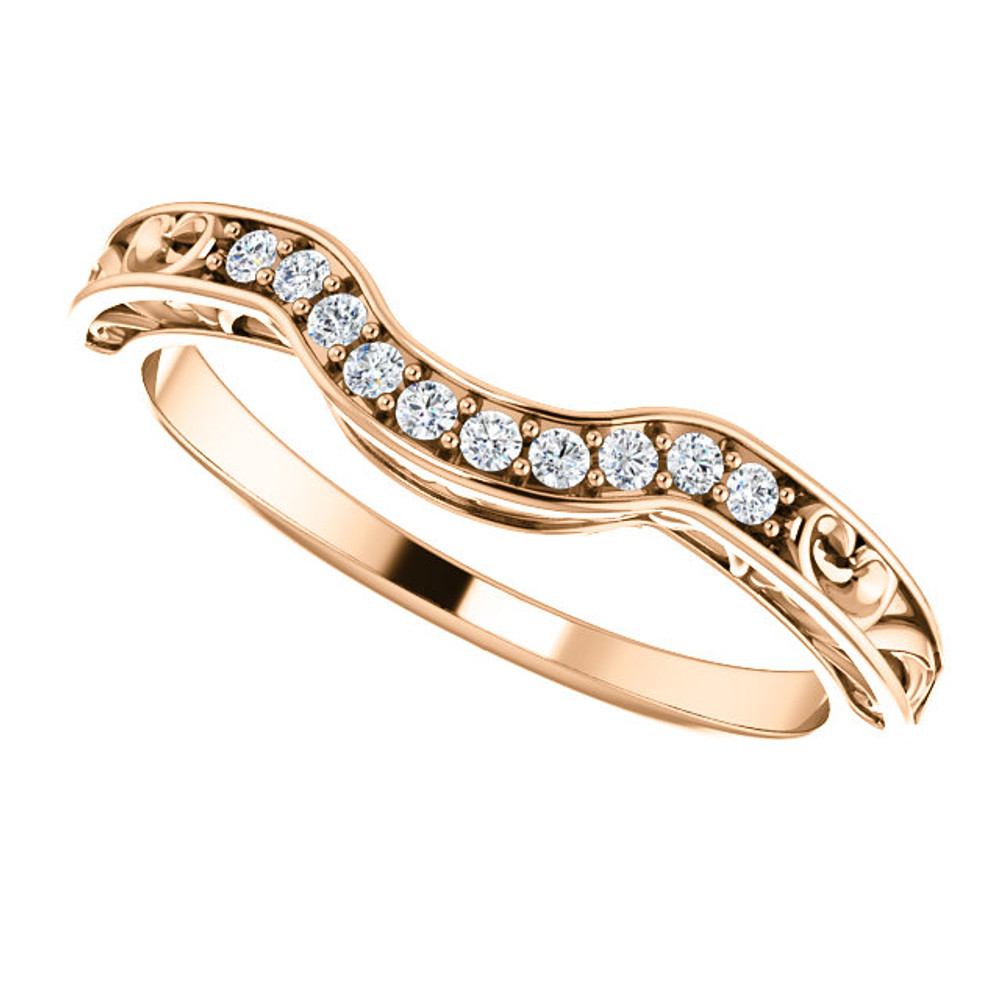 This beautiful diamond wedding band features sparkling 1/6 carat total weight round diamonds in a unique 14 karat rose gold edged with a lovely vintage style that will make a great complement to her engagement ring on her very special wedding day