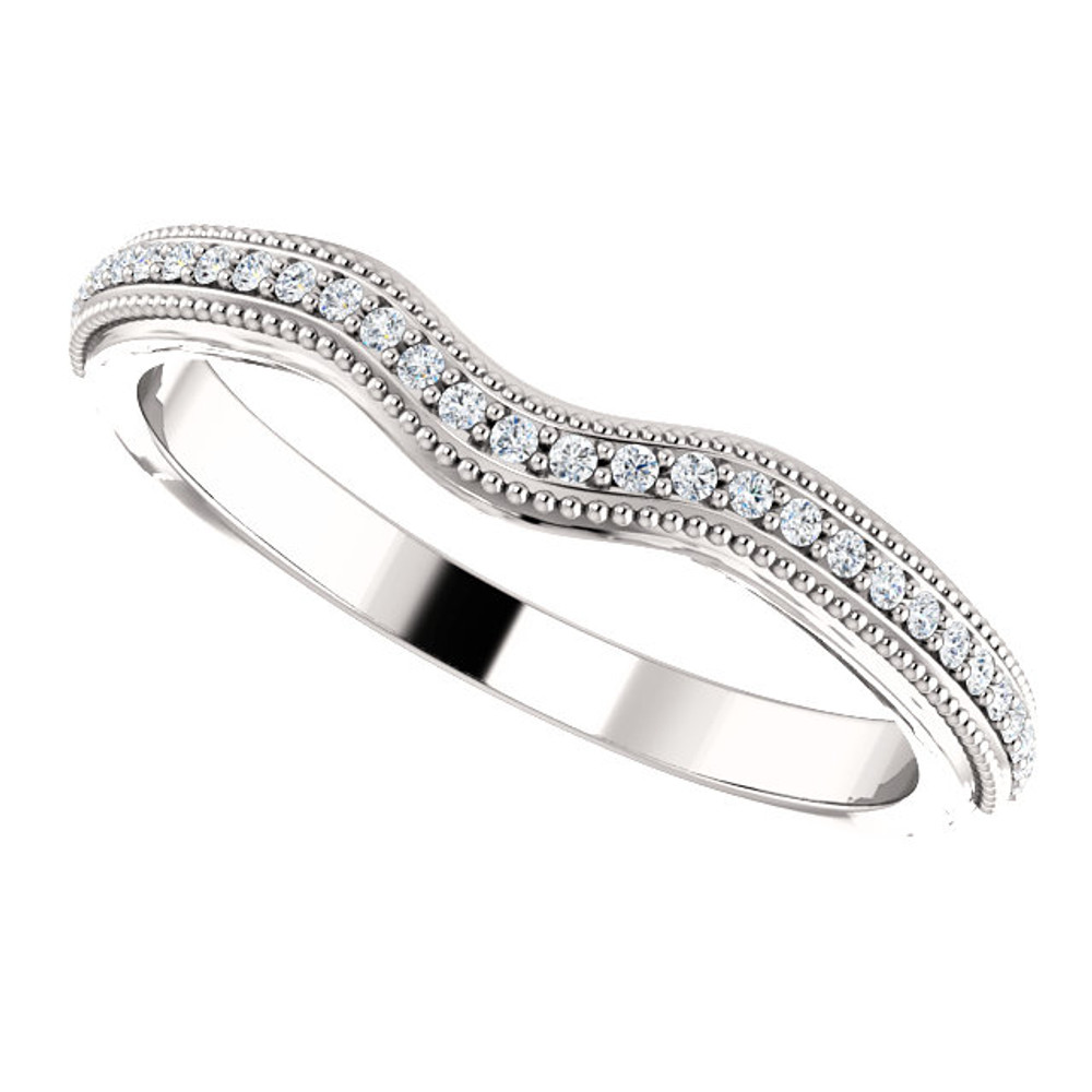 This beautiful diamond wedding band features sparkling 1/8 carat total weight round diamonds in a unique 14 karat white gold edged with a lovely vintage style that will make a great complement to her engagement ring on her very special wedding day