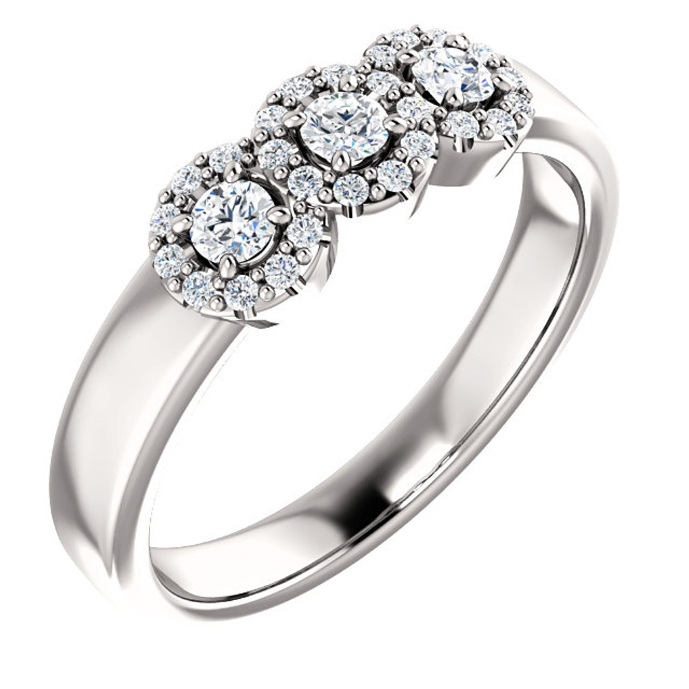 This elegant 14k white gold diamond engagement ring set is breathtakingly simple and modern. The engagement ring's featured three stone diamond halo design, is complemented with 29 sparkling white diamonds.