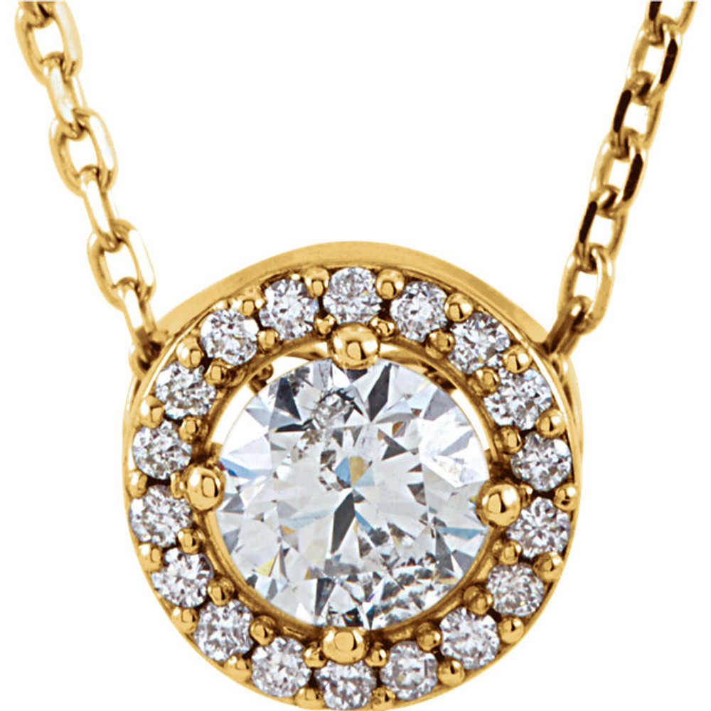 Our designer inspired 1/4 ct. tw. round cut diamond styled 16" halo necklace in 14kt yellow gold is a perfect match for today's style. Show off this wonderful Necklace with any and every outfit. This necklace is simple yet stunning, captivating like no other.