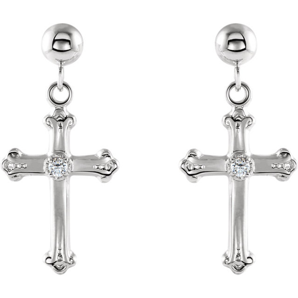 Simple elegance in a faith inspired design diamond cross dangle earrings fashioned from 14k white gold. Earrings measure 15.00x10.50mm with a bright polish to shine.