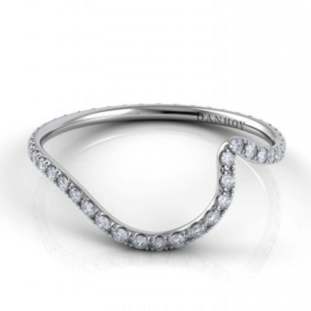 Diamond wedding band curved to perfectly fit with your Danhov engagement ring for an incredible stacked look. 