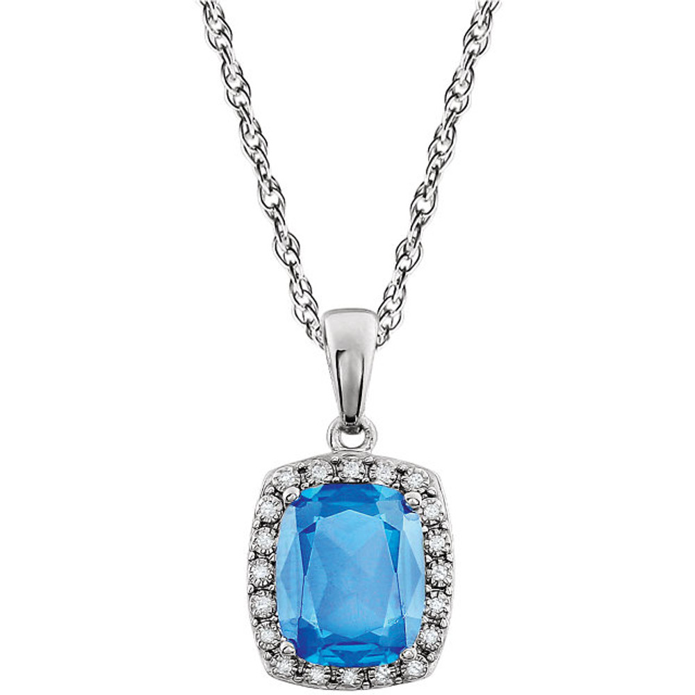 This stunning 14K white gold solitaire pendant necklace features a 10x8mm cushion Swiss Blue Topaz that is complemented by brilliant-cut round diamonds. This December birthstone jewelry would look perfect with any outfit.