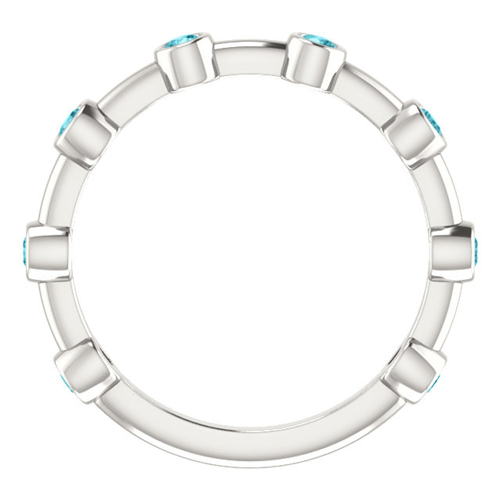 Crafted in sterling silver, this ring features 8, round, blue zircon gemstones.