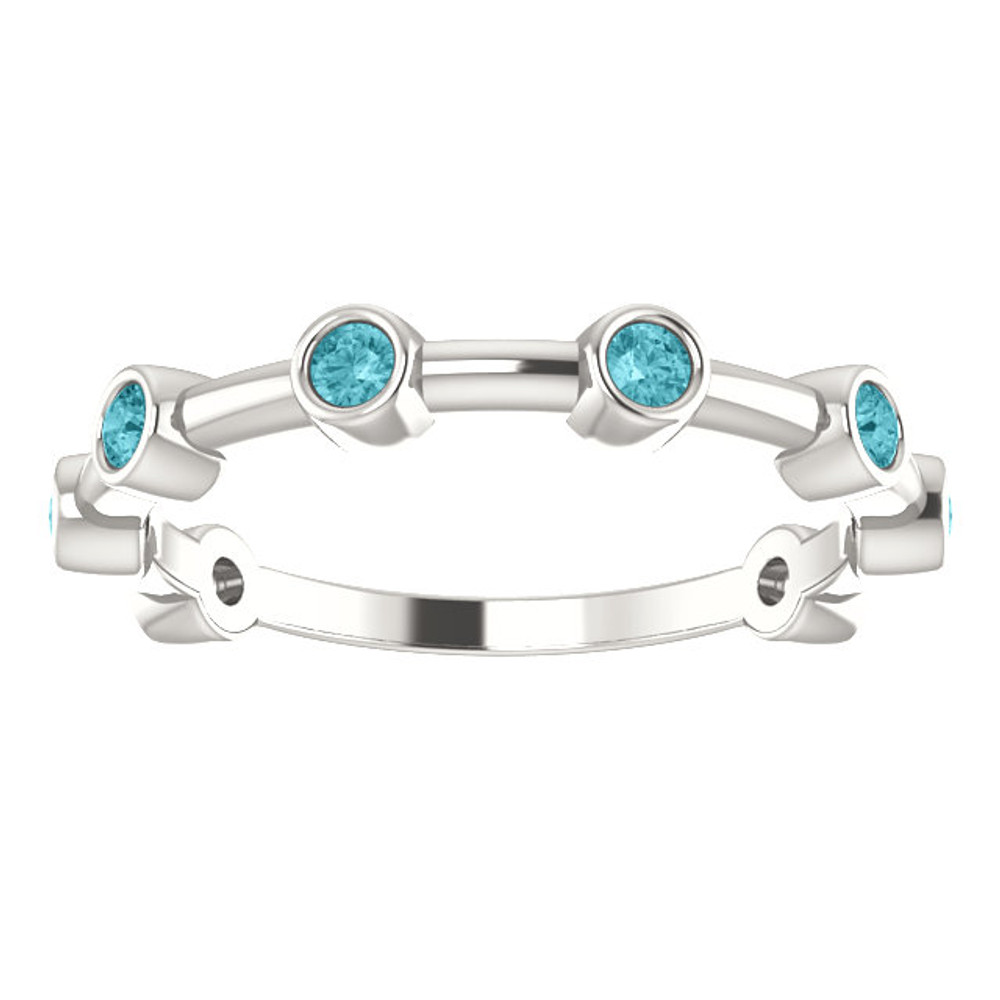 Crafted in sterling silver, this ring features 8, round, blue zircon gemstones.