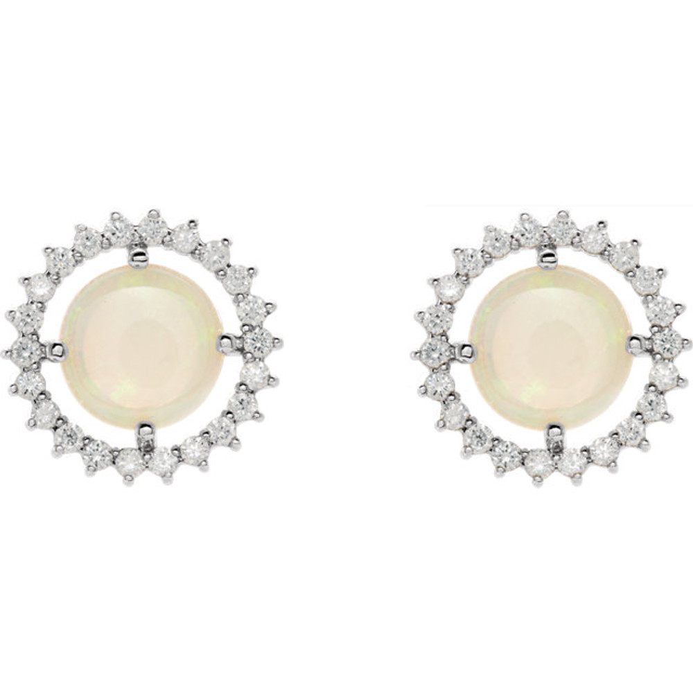 Exquisite platinum earrings capturing the beauty of a round radiant genuine opal in each surrounded by white shimmering diamonds.