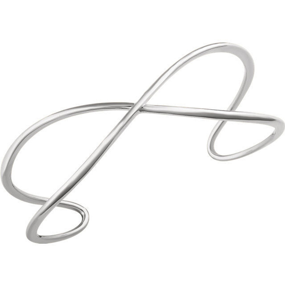 This criss cross cuff bangle bracelet is made of polished 14kt white gold.