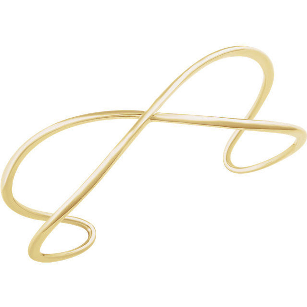 This criss cross cuff bangle bracelet is made of polished 14kt yellow gold.