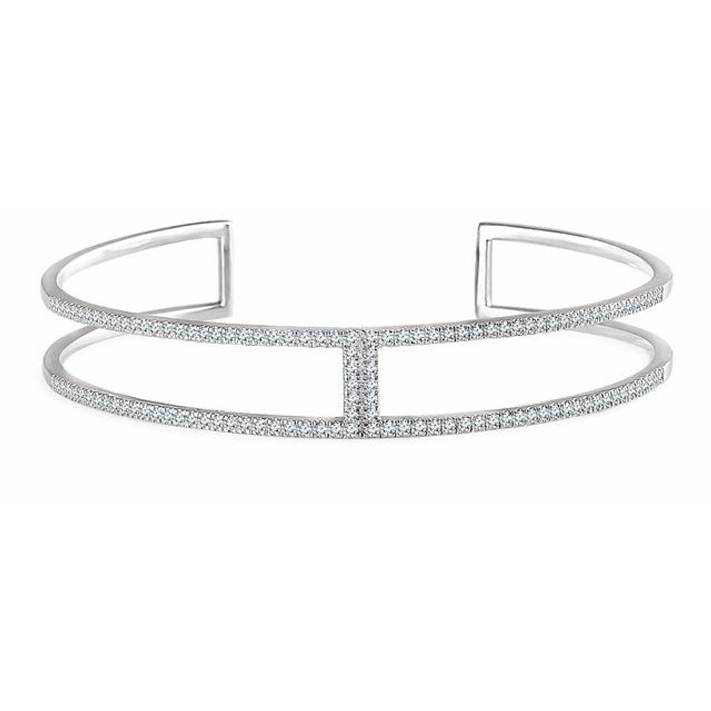 Diamond Cuff Bracelet in 14Kt white gold with 91 diamonds weighing 3/4 ct tw. Adds the perfect edge to a night out.