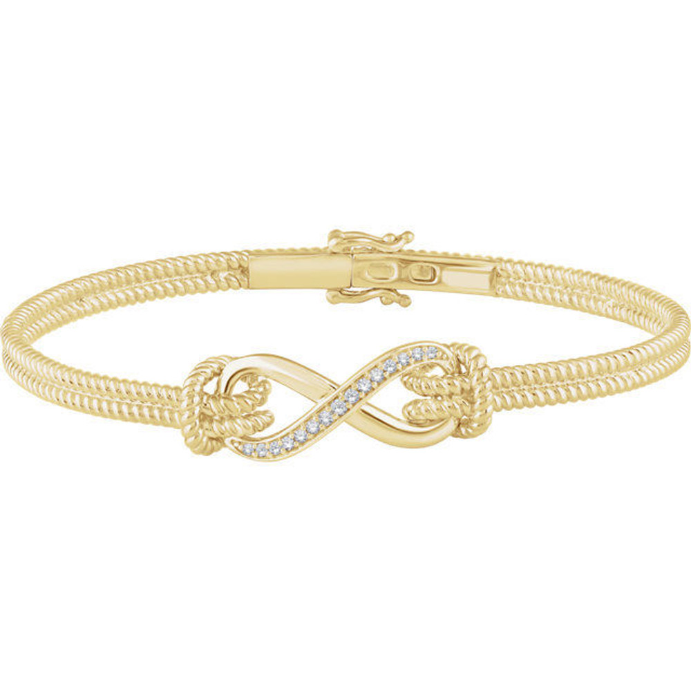 Diamond Infinity-Inspired Rope Bangle Bracelet In 14K Yellow Gold. Diamonds are H+ in color and I1 or better in clarity.