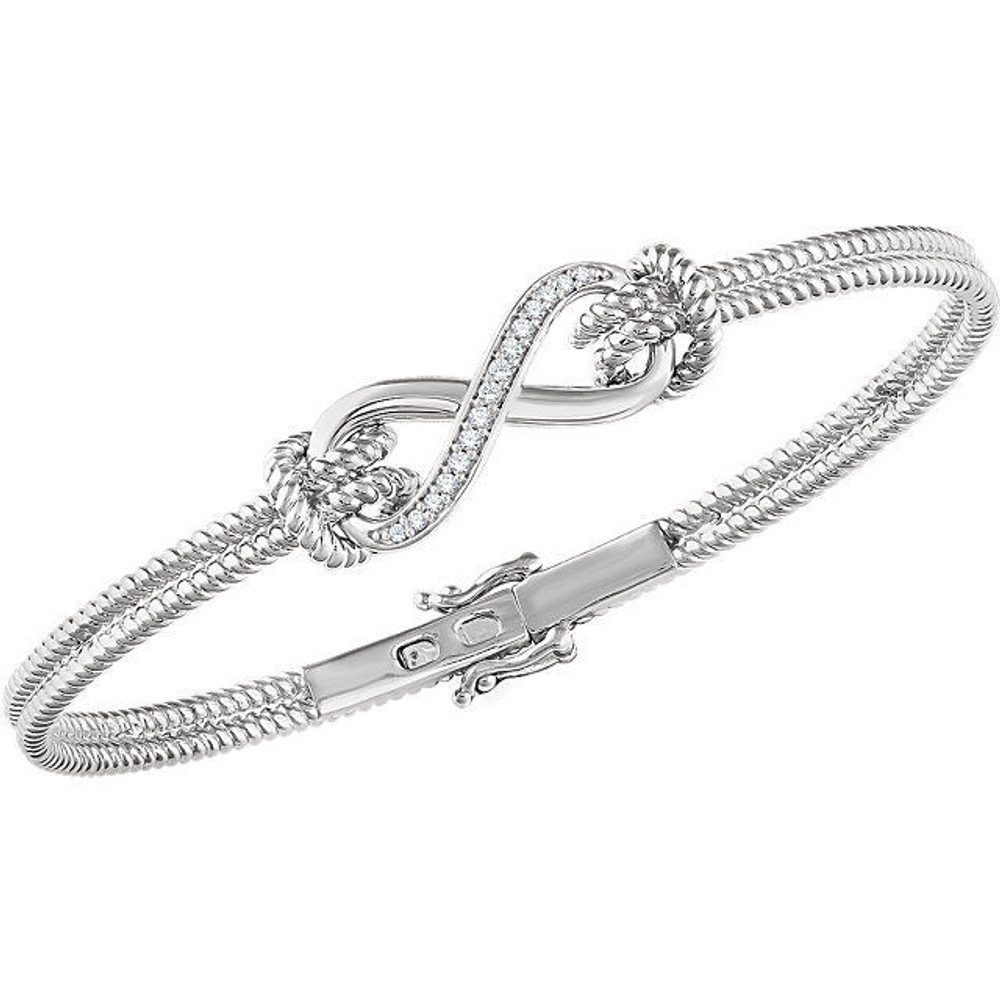 Diamond Infinity-Inspired Rope Bangle Bracelet In 14K White Gold. Diamonds are H+ in color and I1 or better in clarity.