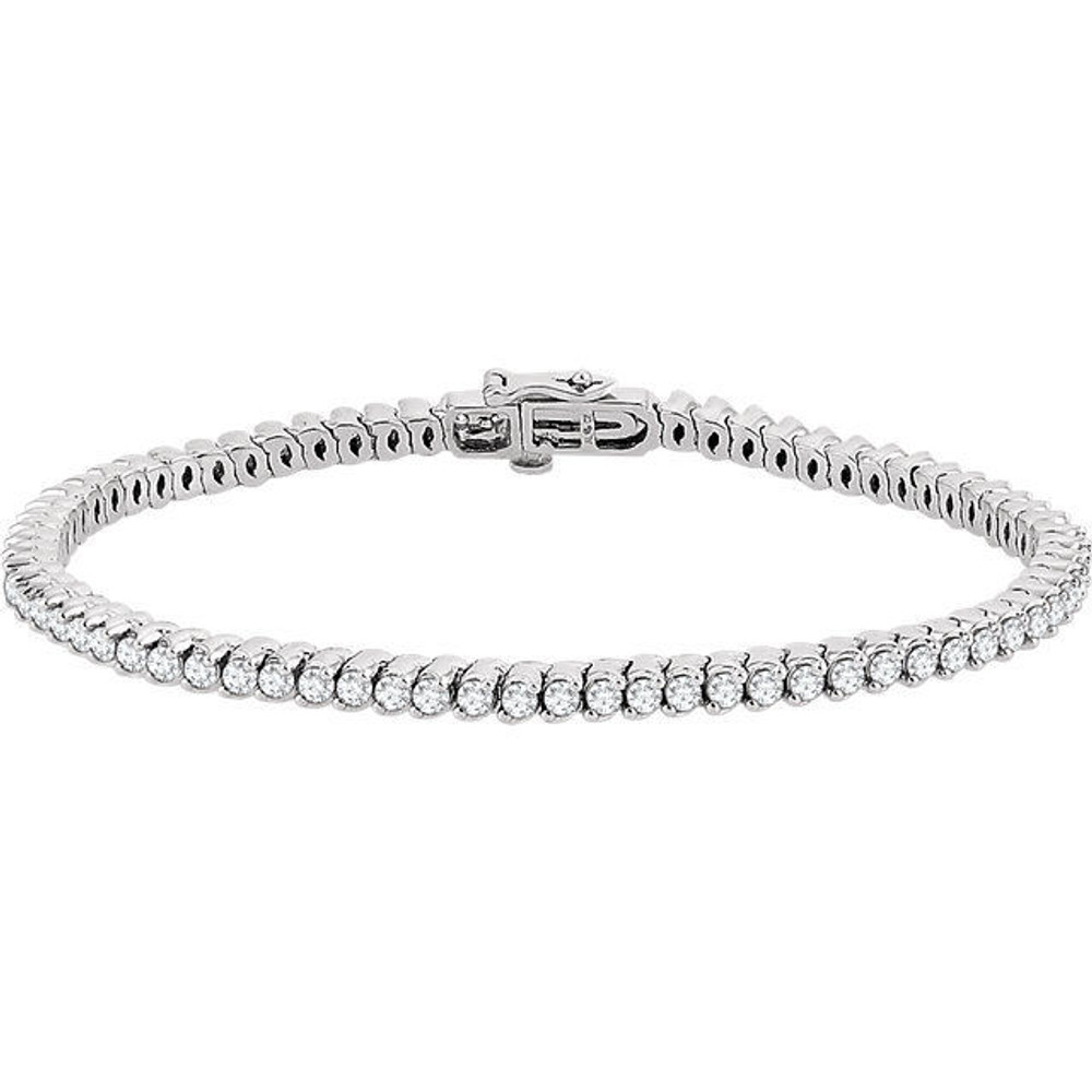 Flash some brilliance with this breathtaking tennis bracelet, showcasing dazzling round diamonds in complementing 14k white gold. 