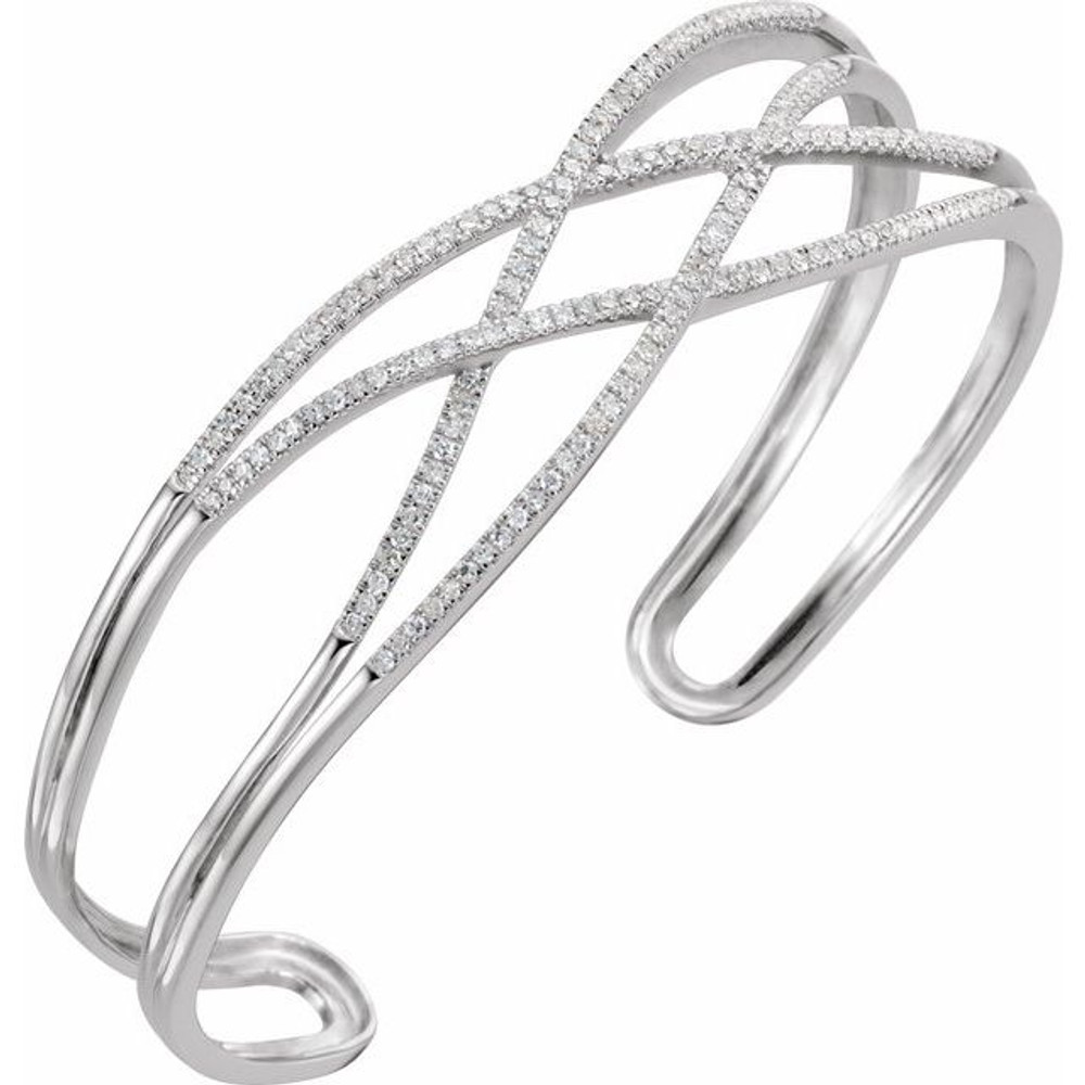 Diamond Cuff Bracelet in 14Kt white gold with 166 diamonds weighing 3/4 ct tw. Adds the perfect edge to a night out.