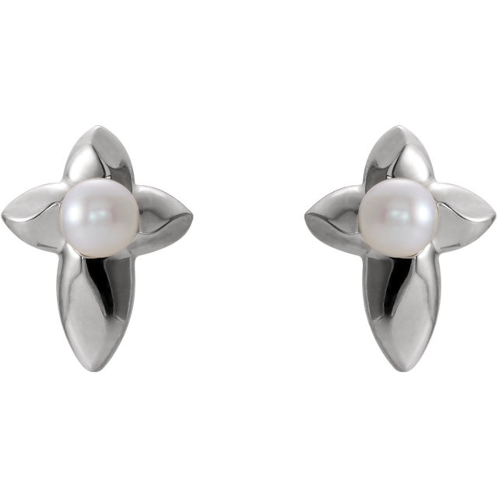 Stylish and symbolic. These freshwater cultured pearl cross earrings are in sterling silver. Each earring measures 11.80x09.00mm and has a bright polish to shine.