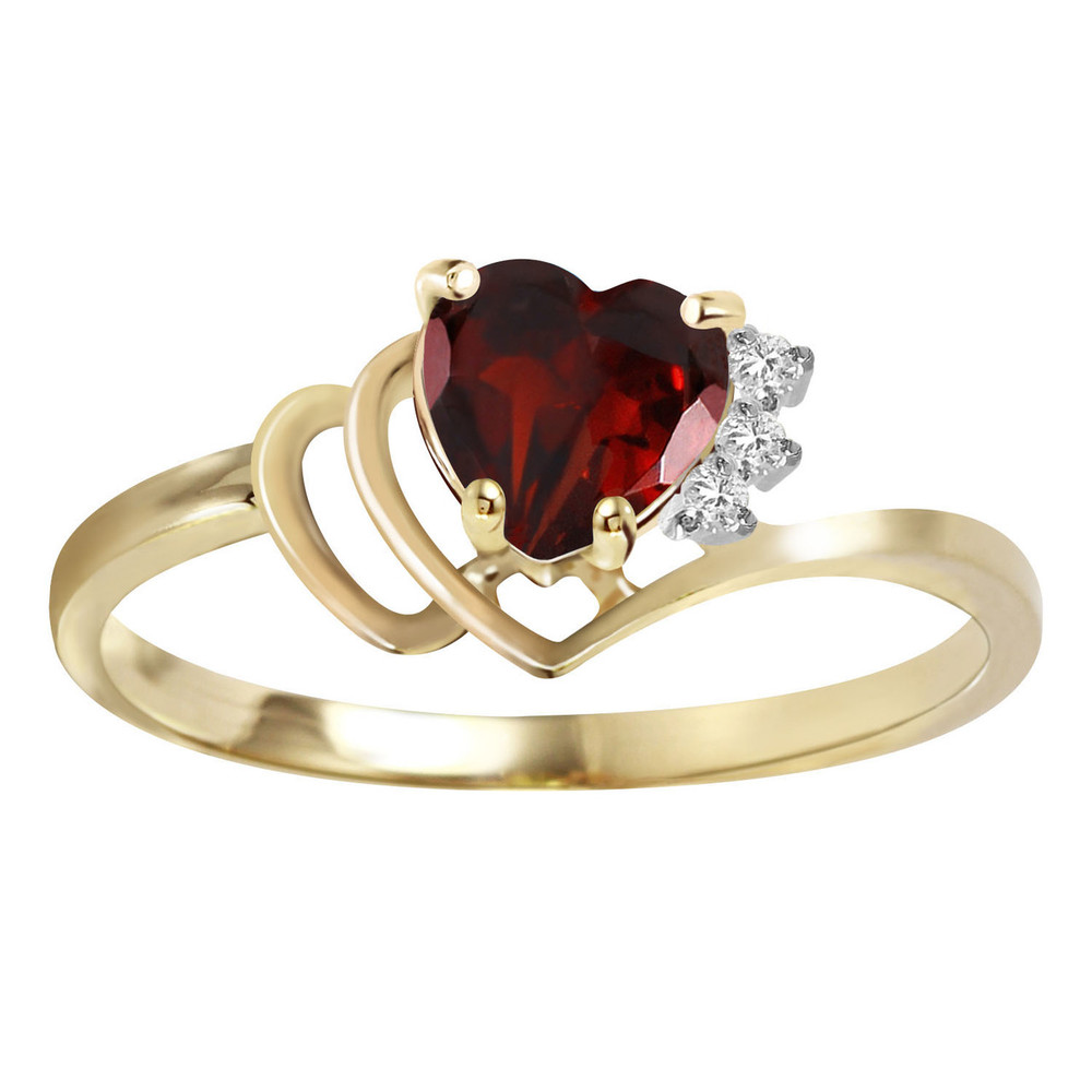 Show that special someone how much she is loved with this gorgeous 14k solid gold ring with natural diamonds and garnet. The heart is the universal symbol for love, and any special lady will know how much she is loved when wearing an almost one carat (.95 carat) garnet heart on her finger. Set on a solid gold band with three round cut accent diamonds, this ring is the perfect gift for any occasion. The classic looks of the ring make it a great choice for any woman. It is also perfect for those who blow out their candles in January as a birthstone ring. As with all natural gemstones, inclusions do appear in the gemstones. However, these do not detract from the beauty of the ring and only add to the character and charm of this stunning classic.