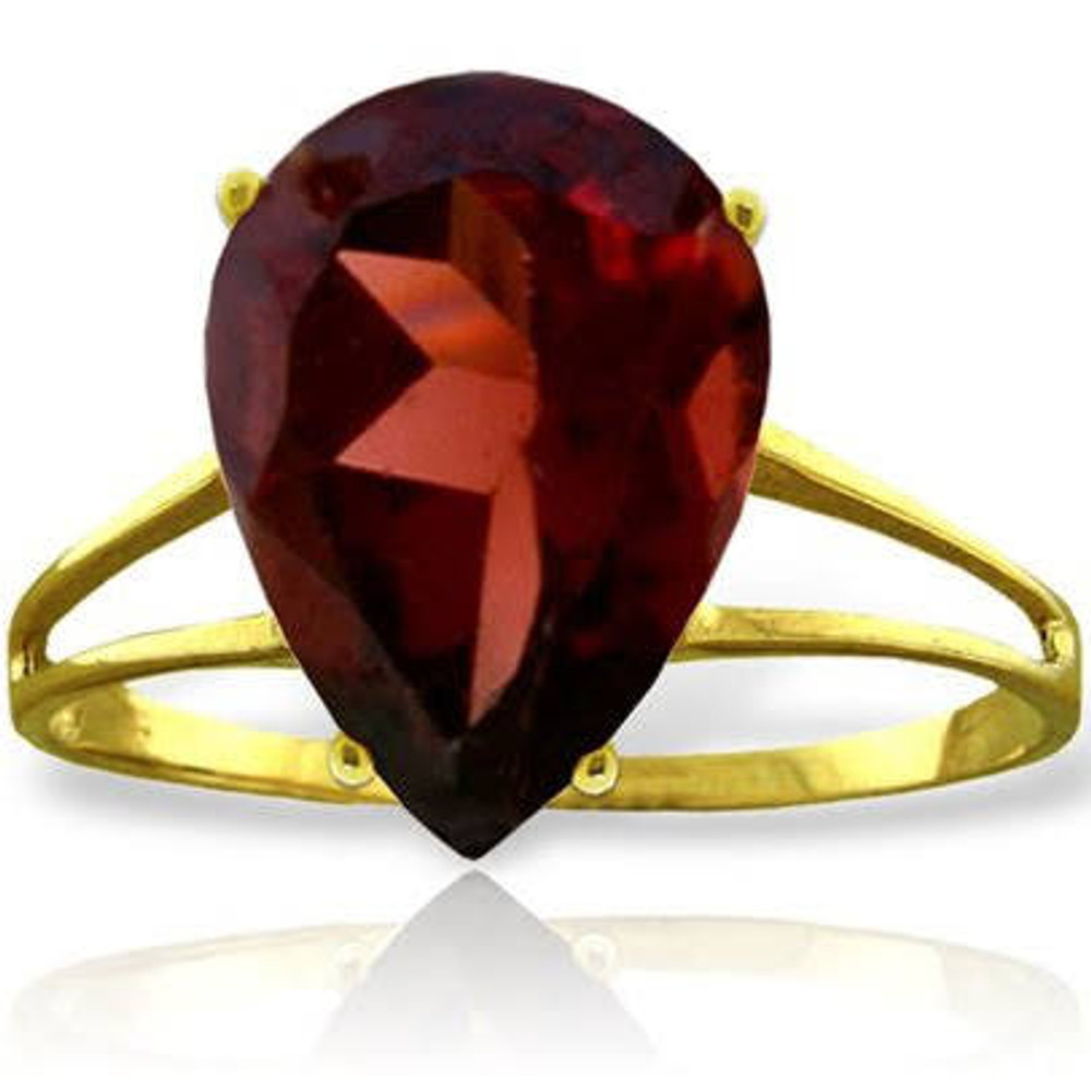 Lustrous deep color is the first thing that is noticed on this amazing 14k solid gold ring with natural garnet. One fiery garnet shows off its facets and depth with five full carats for an amazingly large sized gem.

The stone is allowed to shine in a four prong setting set on a gold band available in white, yellow, or rose gold to add a luxurious touch to this ring. The open design on either side of the gem perfectly enhances the solitaire stone, allowing the shine and beauty of this January birthstone to stand out even more for its lavish beauty.