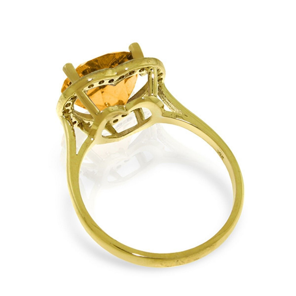 This 14k gold ring with natural diamonds and citrine makes a fabulous November birthstone ring, but is also great for anyone born anytime during the year as a great ring that is wearable everyday. The beautiful band is formed from 14k yellow, white, or rose gold and features a beautiful carved design that makes it stand out and draws attention to the amazing citrine that is the center stone. 