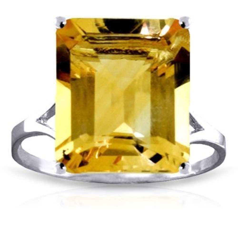  Look absolutely dazzling when you place this 14k gold ring with octagon citrine upon your finger. Citrine is known for its radiant beauty, which is made even more breathtaking when cut in a unique octagon shape. The stone weighs 6.50 carats, adding a jaw dropping amount of sparkle that makes this piece so popular. The gold band has a simple design, with openings on either side of the stone to emphasize the beauty and color. This ring makes an amazing birthstone ring, or is perfect for anyone who loves pieces that are big, bold, and beautiful.