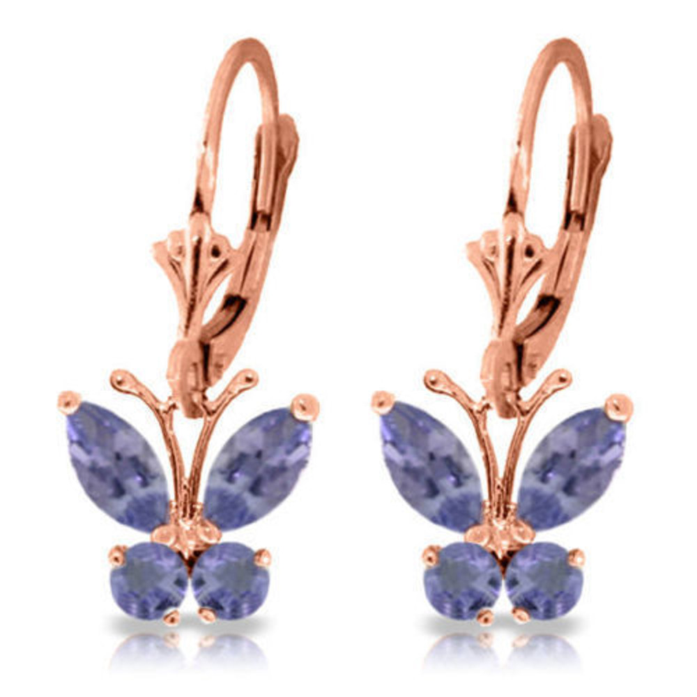 Periwinkle butterflies. What more could a girl ask for? You will feel free and easy when you wear these 14K gold Butterfly Earrings with Natural Tanzanites. Each earring is made with two marquise shaped 0.85 carat and two round shaped 0.39 carat Tanzanite jewels. These amazing stones are arranged and set into a butterfly design.


These earrings dangle 23.6mm, just right for getting noticed but still having the delicate and feminine appeal that all butterflies demand. The earring bases are leverback style and are made of 14K gold. What more could a girl want than these fluttery beauties that seem right out of a cottage garden?