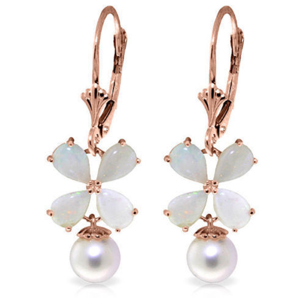 With the gorgeous glow of opal and the lovely luster of pearl, the wearer of the 14-Karat gold Leverback Earring with Opals and Pearls shines. Four teardrop-shaped opals are arranged symmetrically to form a four-petaled flower pattern on each earring. A round pearl hangs from the center of each flower like a glistening drop. The 14-Karat gold Leverback Earring with Opals and Pearls dangles from a leverback clasp. This earring design and its semiprecious stones are dressy enough to wear for special occasions. However, the neutral white hues of the stones, with hints of various glittering colors in the opal, make this the go-to earring for every occasion.