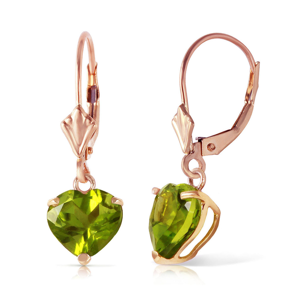 Give that special someone born in August your heart with these gorgeous 14k gold leverback earrings with natural peridot. The elegant leverback design allows these beautiful gems to move and sparkle, while also holding them securely and comfortably against the earlobes. Two heart shaped stones offer a cute and fun look while adding 3.25 carats of total glamor and shine, perfect for showing off the beautiful color of peridot. The solid 14k gold construction, made in your choice of yellow, white, or rose gold, gives these cute and feminine earrings a rich and luxurious look.