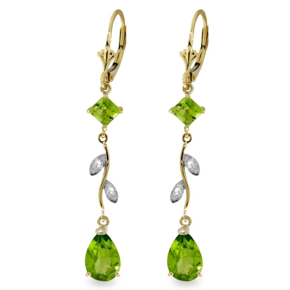This pair of 14k gold chandelier earrings with diamonds and peridot cascades with brilliance and elegance. These earrings incorporate a variety of different shapes to give these jewels a unique look. Four round cut diamonds, two square shaped period, and two pear shaped peridot stones add shine and glamor to these fabulous earrings. The classic leverback style allows these earrings to be worn with ease and comfort. This versatile pair of earrings is a perfect addition to any fine jewelry lover's collection.