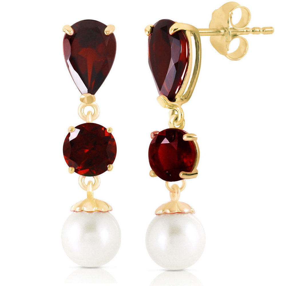 With these 14k solid gold chandelier earrings with garnets and pearls, the lovely depth and beauty of garnets is offset by the pure white appearance of pearls. Those who love to mix and match their gemstones will love the elegant look that these stylish earrings have to offer. Five carats of pearls and five and a half carats of gorgeous natural garnets set in real gold makes these earrings look and feel rich and luxurious. At over one inch long, they dangle dramatically from the earlobes, ensuring that they are always seen.