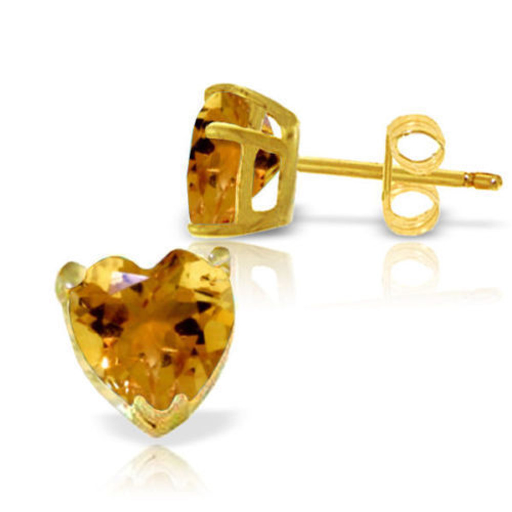 Citrine studs make a wonderful birthday gift for all beautiful women born in the month of November. These 14k gold stud earrings with natural citrine show off the warmth and beauty of this gorgeous stone in a style that is easy to wear. Each pair features two heart shaped citrine stones that are simply radiant and charming, with both gemstones weighing over three carats for classic glitz and glamor. Each earrings features gold prongs, posts, and friction push backs that hold them securely in place while making them comfortable enough to wear daily.