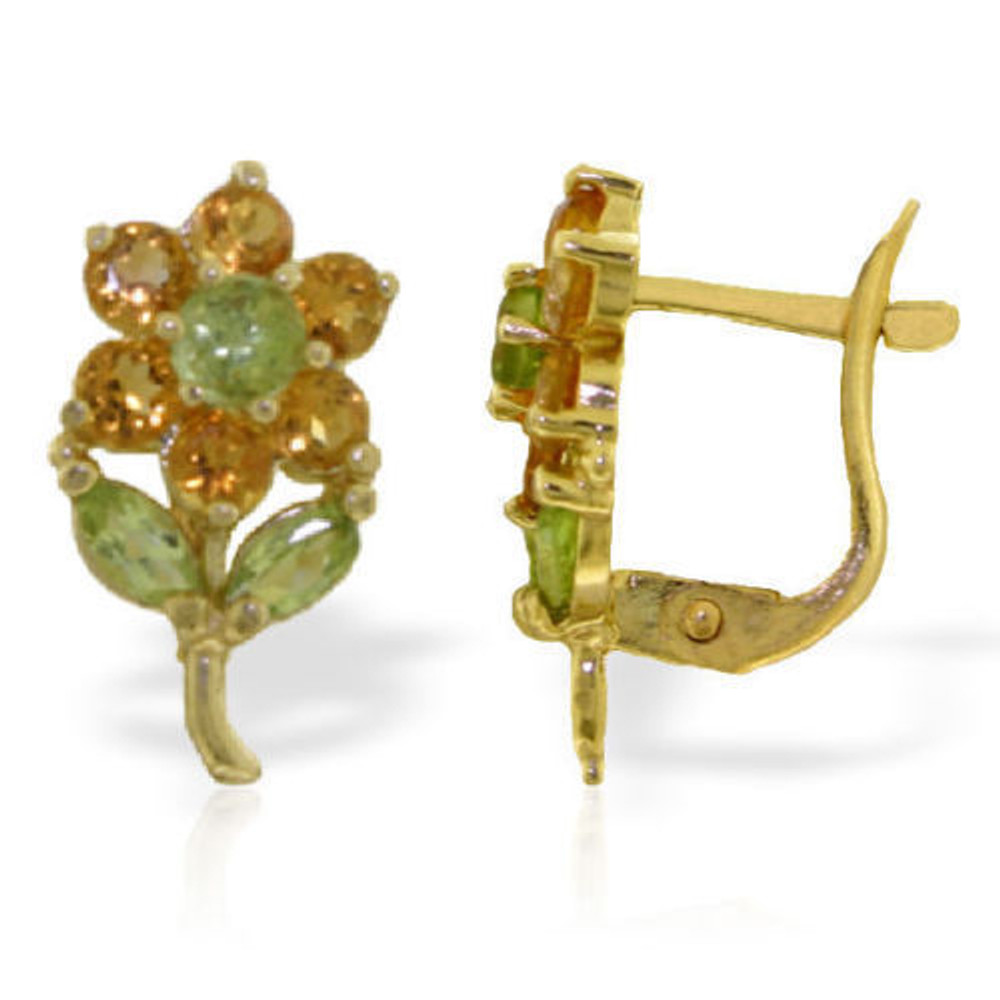 Instead of a bouquet, opt to give your loved one these 14k gold flower stud earrings with citrine and peridot. These flowers are amazingly designed and crafted to look like realistic flowers that sparkle beautifully. Twelve round cut citrine stones are set in each pair to create delicate and beautiful petals. They are accented by one round cut peridot, while two marquise cut peridot stones form the leaves. The golden stem, posts, and clasps are made of high quality 14k yellow, white, or rose gold. Over two full carats of gorgeous natural stones make these earrings shine brilliantly whenever they are worn.