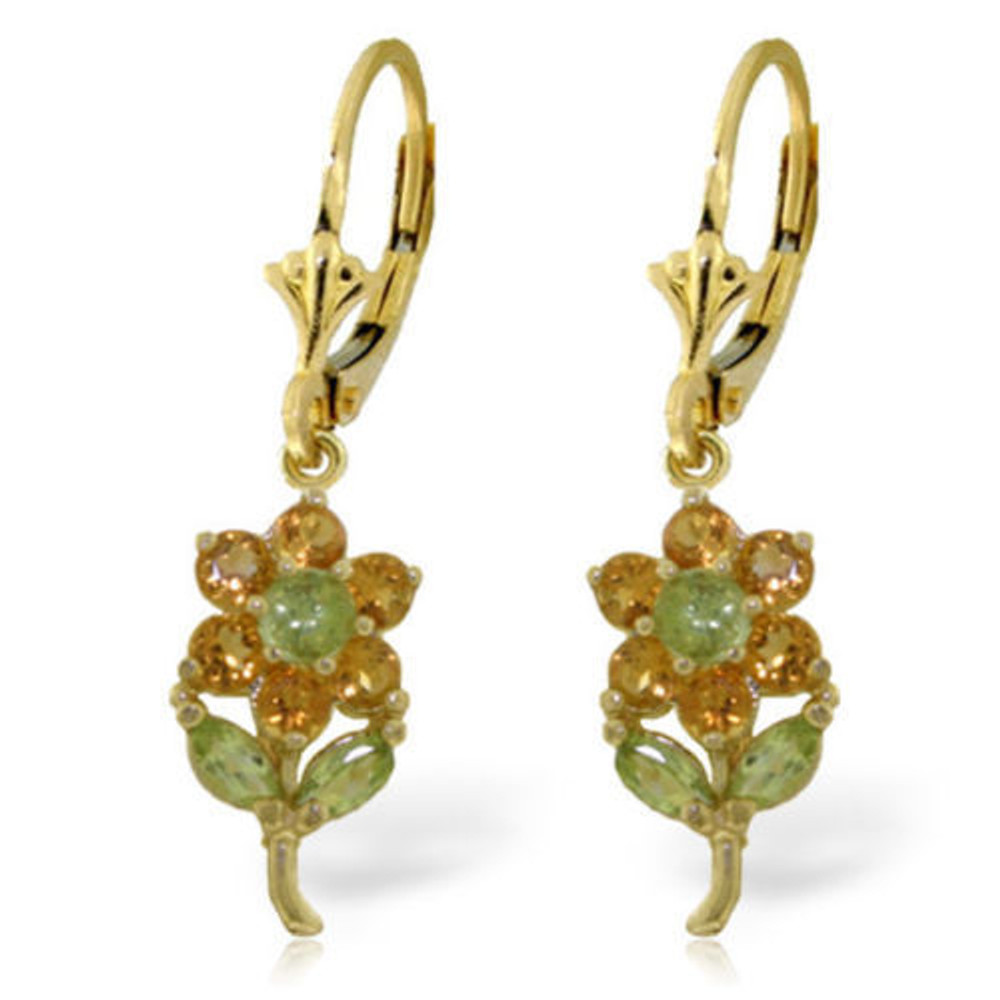 These fanciful 14k gold flowers earring with citrines and peridots will make you feel lovely and charming as you wear them. The flower drops are connected to a gold-leverback earring post that loops easily through your ear piercings. These flowers are 1.2 inches high, and dangle gently from a loop on the earring hooks. These fancy earrings have a total of 2.12 carats. They are easy to pair with just about any dress, pantsuit, or even jeans and a t-shirt. These flowers are sparkling and delightful, and sure to please anyone that wears them. Makes a great gift for a loved one such as a niece or aunt.