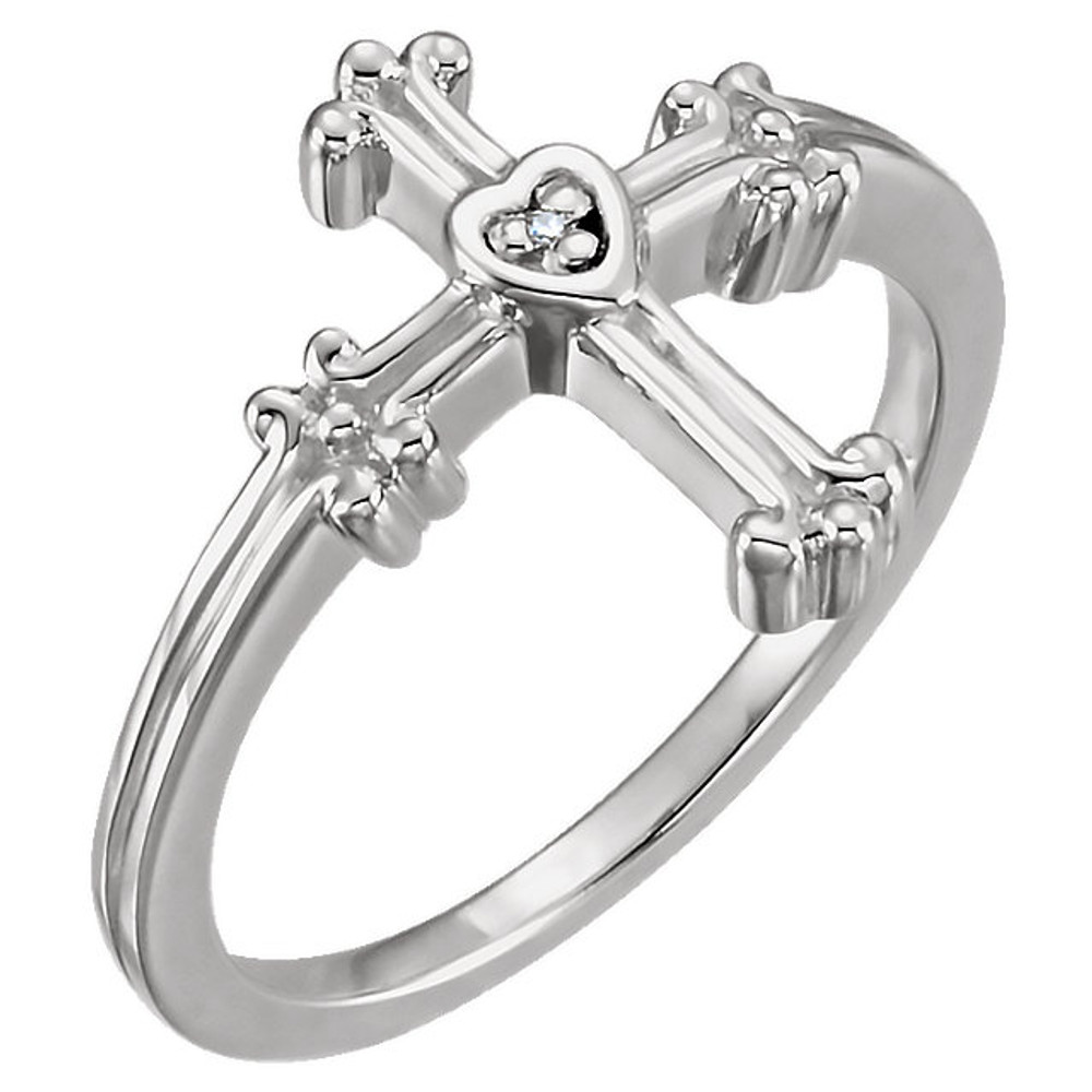 Crafted in 14k white gold this ring features a diamond solitaire set in a heart and ornate cross setting.