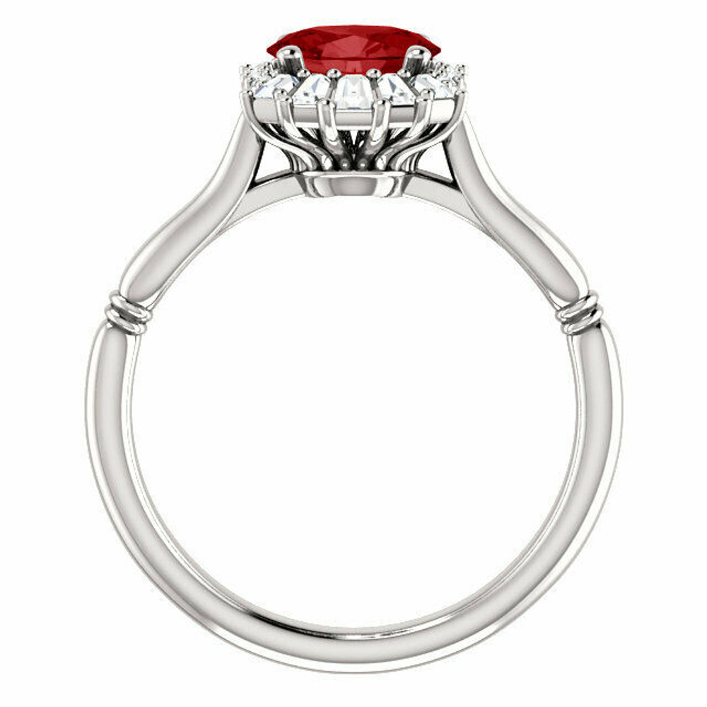 Crafted in platinum, this ring features one oval Genuine Ruby gemstone accented with 18 genuine diamonds. 