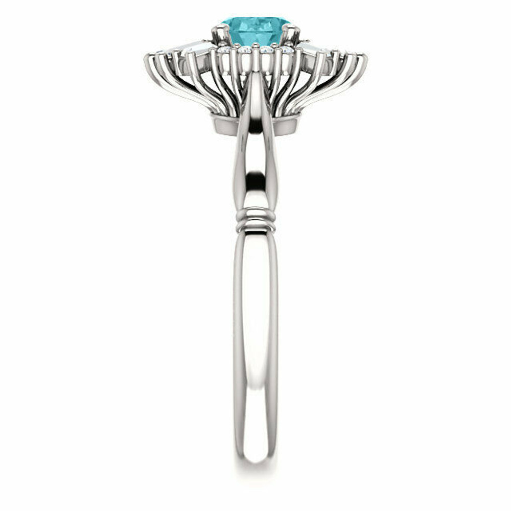 Crafted in platinum, this ring features one oval Genuine Blue Zircon gemstone accented with 18 genuine diamonds.