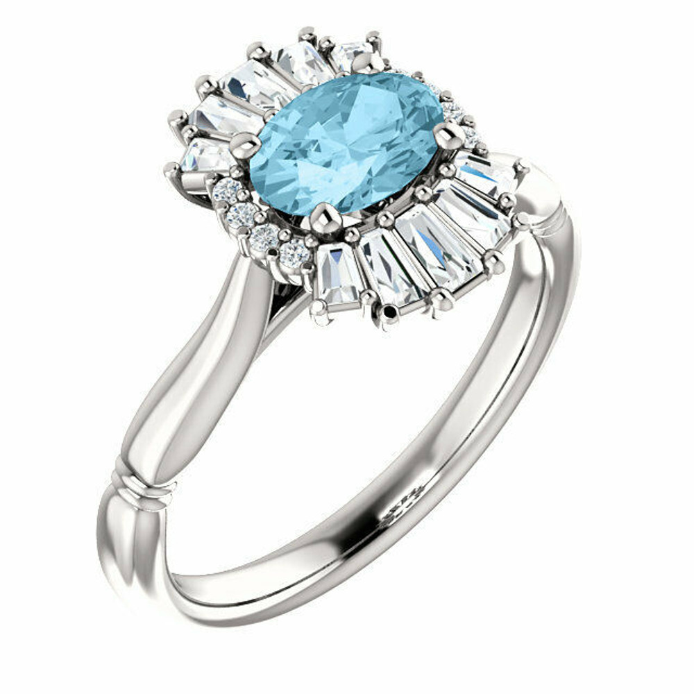 Crafted in sterling silver, this ring features one oval Genuine Aquamarine gemstone accented with 18 genuine diamonds. 