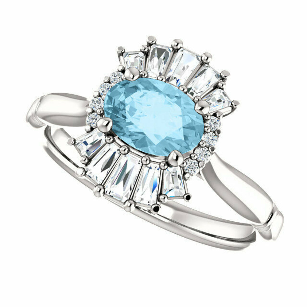 Crafted in 14k white gold, this ring features one oval Genuine Aquamarine gemstone accented with 18 genuine diamonds. 