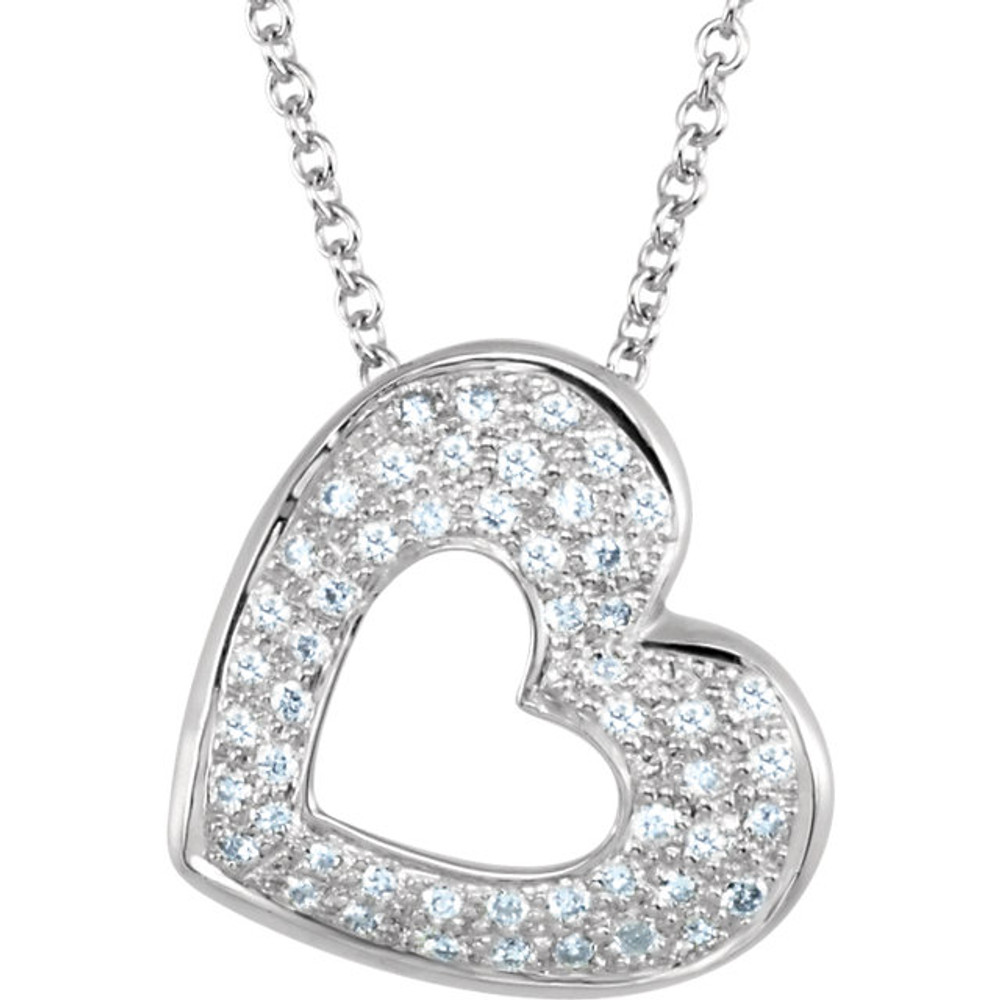 This petite heart pendant crafted from 14k gold is prong set with 55 round diamonds totaling 1/4 ct. tw. and will set hearts aflutter with its sparkling open design. The polished slide is approximately 13mm long by 14mm wide and comes with a matching 18-inch cable chain. The various sized diamonds are I1 in clarity and H-I in color.