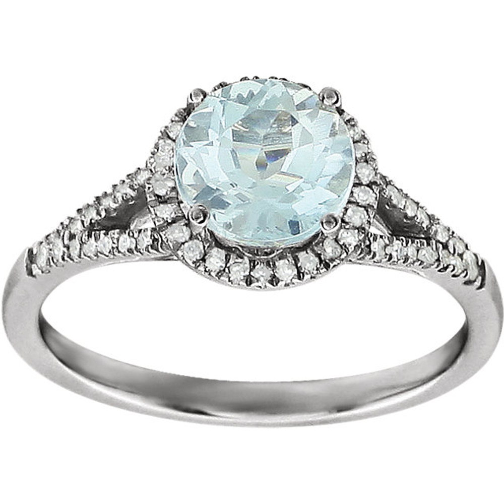 Beautiful Halo-style Gemstone Ring in 14K White Gold featuring a Natural Aquamarine Gemstone & Diamonds. The ring consist of 1 Round Shape, 7.0 mm, Aquamarine Gemstone with 56 Accent genuine Diamonds. This ring is both Elegant and Classic - Perfect for everyday. The inherent beauty of these gems make this an ideal way for you to show your love to someone you care for.