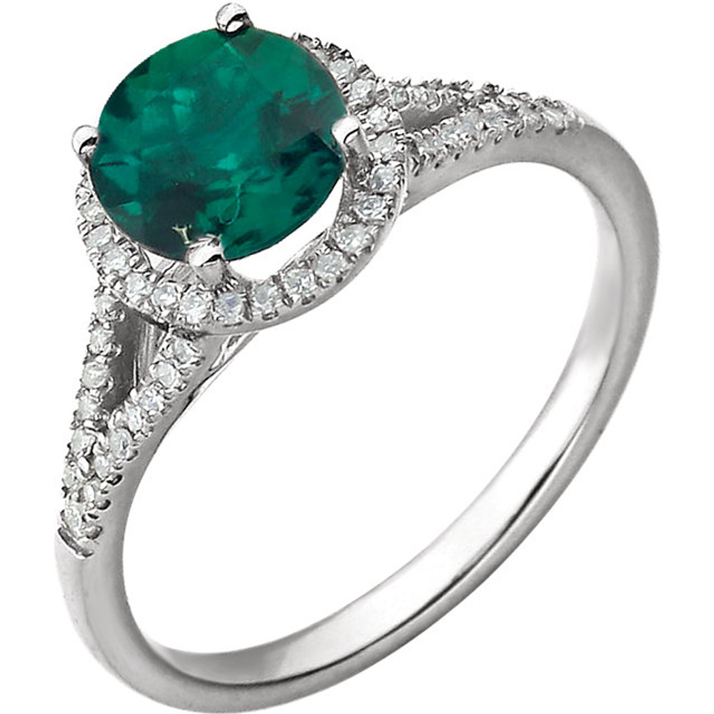 Beautiful Halo-style Gemstone Ring in 14K White Gold featuring a created emerald ring Gemstone & Diamonds. The ring consist of 1 Round Shape, 7.0 mm, Created Emerald Gemstone with 56 Accent genuine Diamonds. This ring is both Elegant and Classic - Perfect for everyday. The inherent beauty of these gems make this an ideal way for you to show your love to someone you care for.