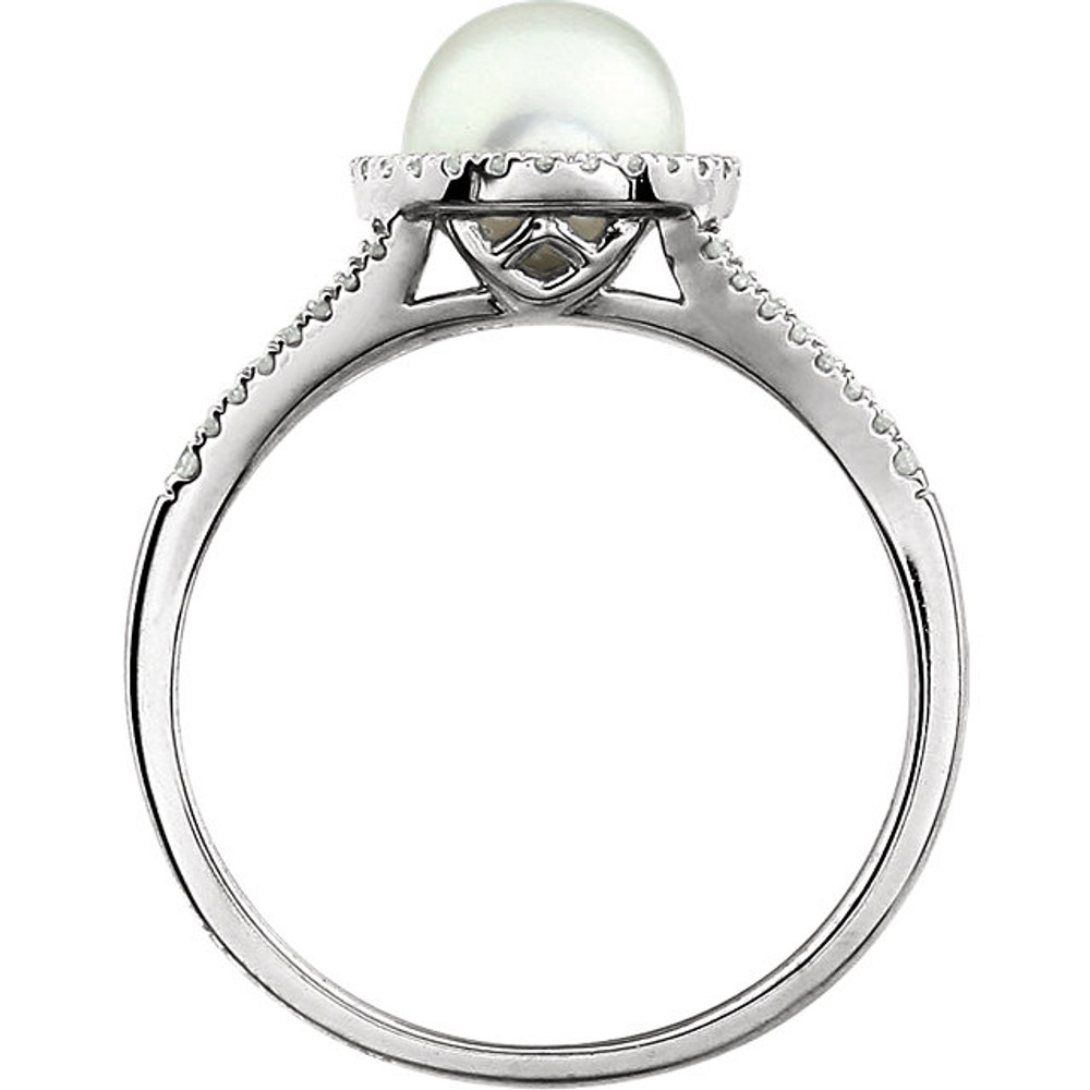 Beautiful Halo-style Gemstone Ring in 14K White Gold featuring a pearl ring Gemstone & Diamonds. The ring consist of 1 Round Shape, 7.0 mm, Pearl Gemstone with 56 Accent genuine Diamonds. This ring is both Elegant and Classic - Perfect for everyday. The inherent beauty of these gems make this an ideal way for you to show your love to someone you care for.