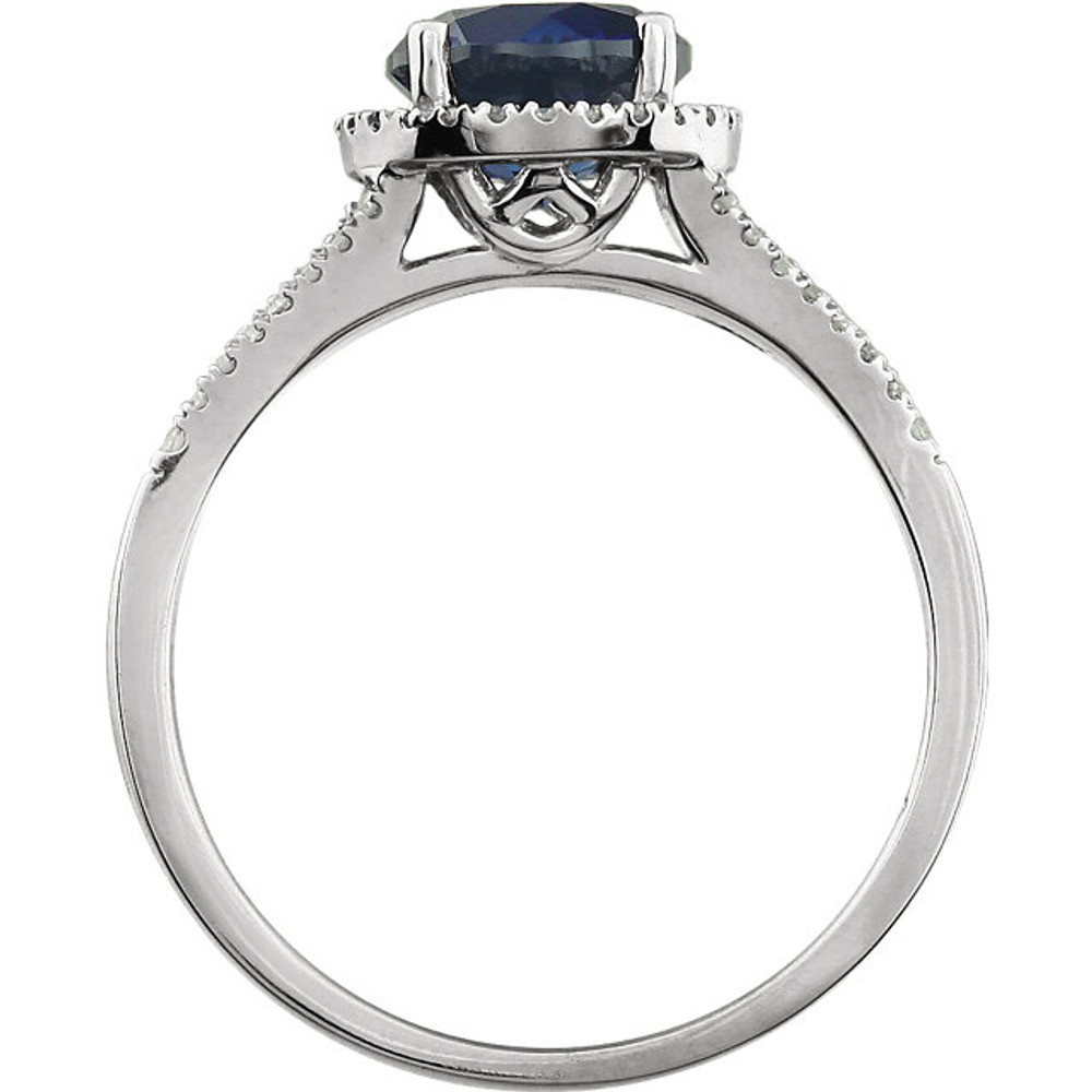 Beautiful Halo-style Gemstone Ring in 14K White Gold featuring a created blue sapphire ring Gemstone & Diamonds. The ring consist of 1 Round Shape, 7.0 mm, Created Blue Sapphire Gemstone with 56 Accent genuine Diamonds. This ring is both Elegant and Classic - Perfect for everyday. The inherent beauty of these gems make this an ideal way for you to show your love to someone you care for.