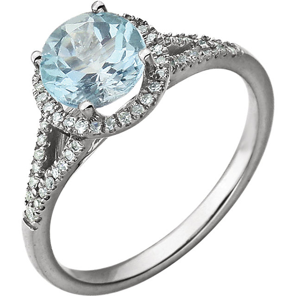 Beautiful Halo-style Gemstone Ring in 14K Solid White Gold featuring a blue topaz ring Gemstone & Diamonds. The ring consist of 1 Round Shape, 7.0 mm, Blue Topaz Gemstone with 56 Accent genuine Diamonds.  This ring is both Elegant and Classic - Perfect for everyday. The inherent beauty of these gems make this an ideal way for you to show your love to someone you care for.