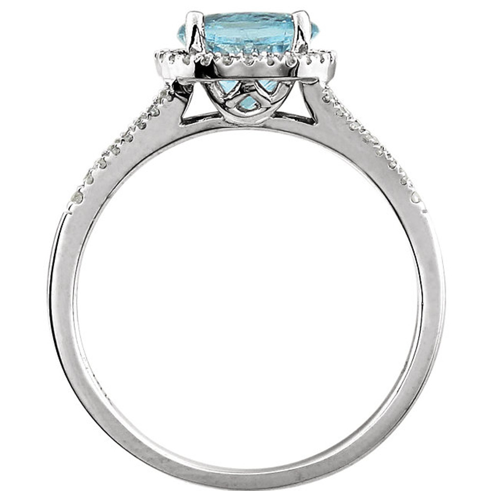 Beautiful Halo-style Gemstone Ring in 14K Solid White Gold featuring a blue topaz ring Gemstone & Diamonds. The ring consist of 1 Round Shape, 7.0 mm, Blue Topaz Gemstone with 56 Accent genuine Diamonds.  This ring is both Elegant and Classic - Perfect for everyday. The inherent beauty of these gems make this an ideal way for you to show your love to someone you care for.