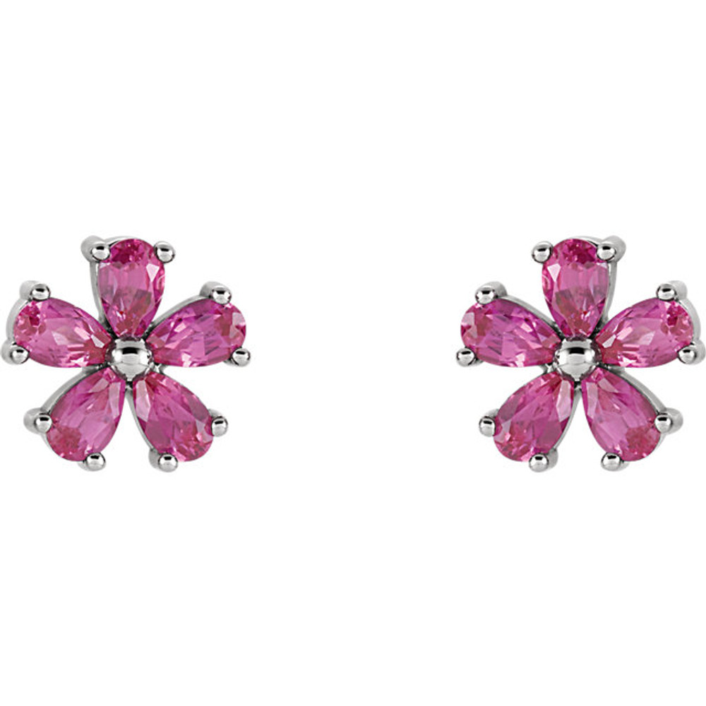 An alluring lab-created pink sapphire makes a vibrant statement in each of these stylish earrings for her. Crafted in 14K white gold, These fine jewelry earrings are secured with friction backs.
