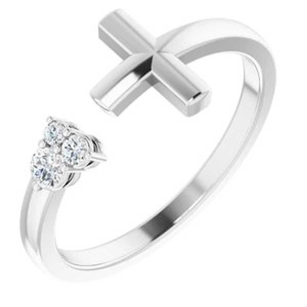 Beautiful and fashionable platinum diamond negative space cross ring. Features .10 carat of sparkling natural round diamonds. This ring is hand made with superior craftmanship.