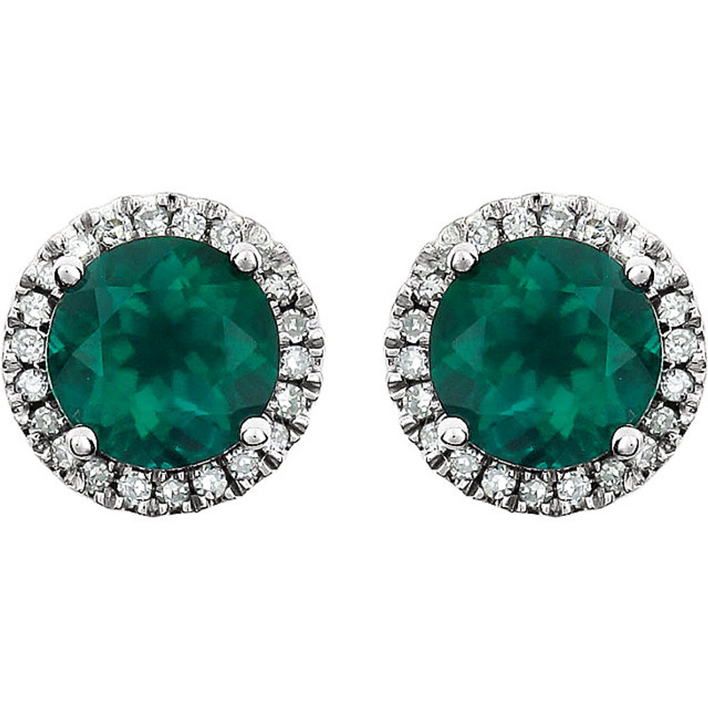 A beautiful crafted 14k white gold 1/8 ct. tw. diamond & 6mm emerald friction post stud May birthstone earrings. Emerald is the birthstone for May representing the symbol of rebirth and is believed to grant good luck and youth. Emerald is derived from the word smaragdus, meaning green in Greek and was mined in Egypt as early as 330 B.C. Most of the world’s emeralds are mined in Colombia, Brazil, Afghanistan, and Zambia today.